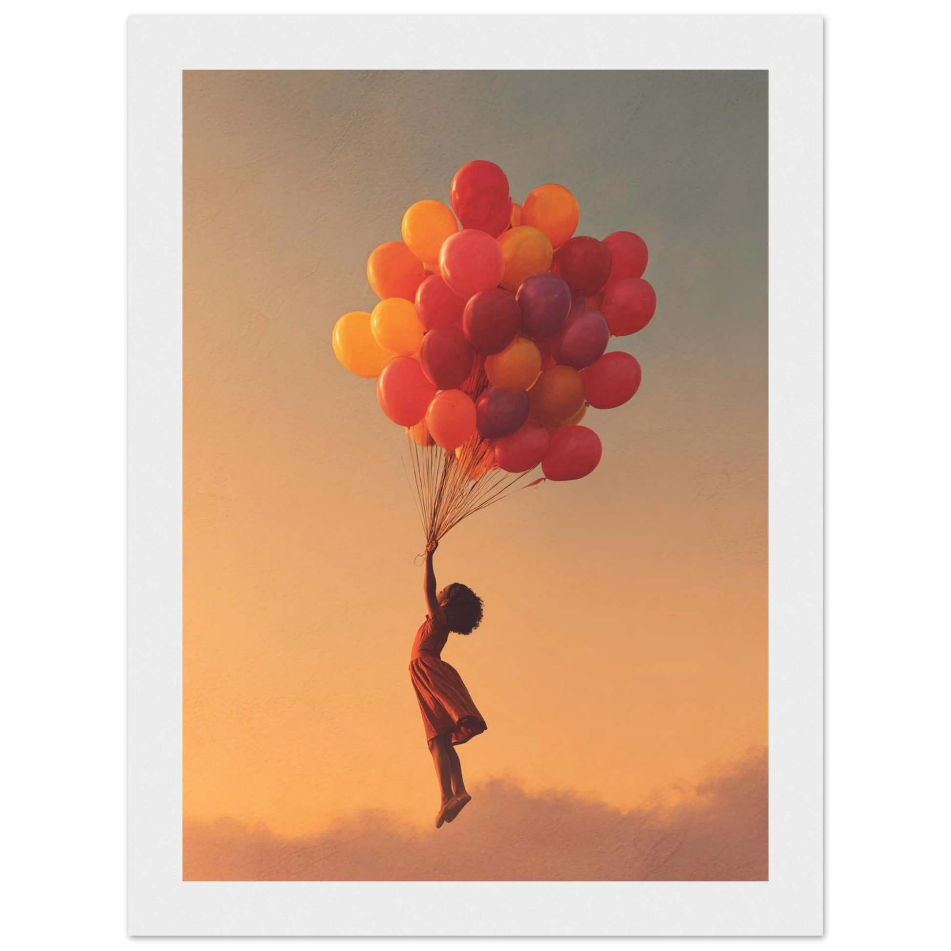 Framed artwork of a silhouette holding colorful balloons against an orange sky.